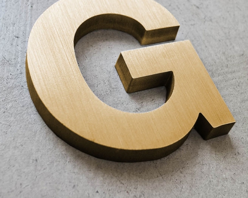 Metal sign in Gold Metal sign in Gold