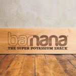 Etched wood sign for Barnana