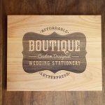 Laser etched wood sign for Boutique