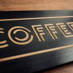 Laser etched black wood sign for KP's Coffee Shack