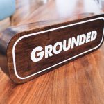 Grounded tabletop walnut wood sign