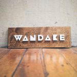 Wandake metal and wood raised sign