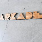Arkade Light Wood Sign