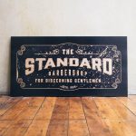 The Standard Barbershop Etched Black Wood Sign