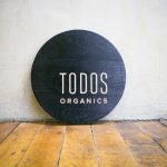 Todos Organics Black Round Etched Sign