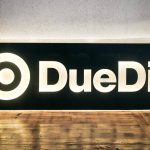 DueDil illuminated logo wood sign