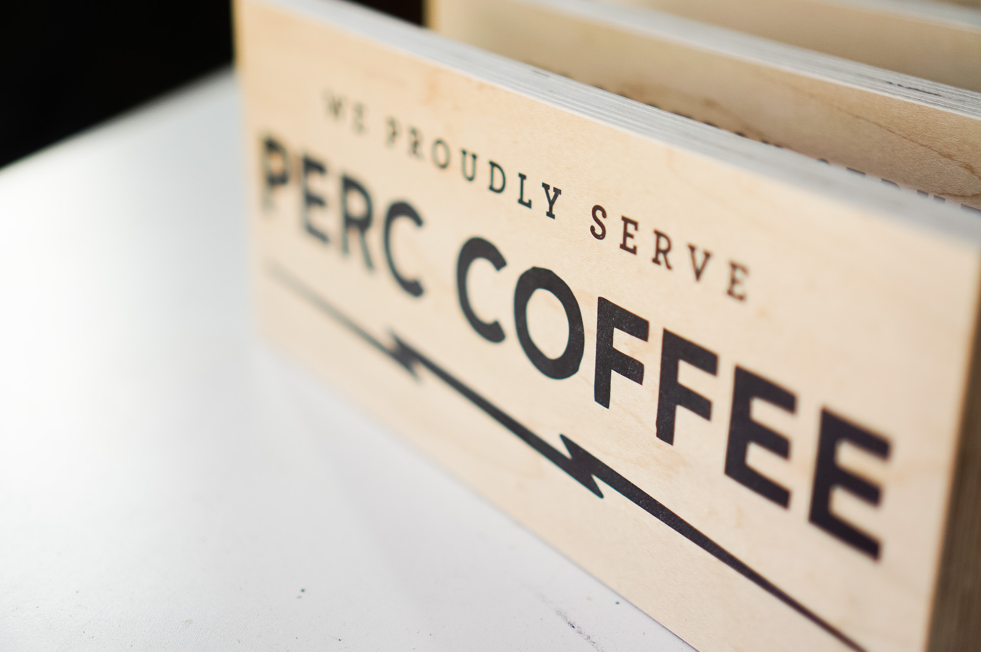 Wood tabletop retail signs for Perc Coffee, a premium coffee roaster in the heart of beautiful Savannah, GA Wood tabletop retail signs for Perc Coffee, a premium coffee roaster in the heart of beautiful Savannah, GA