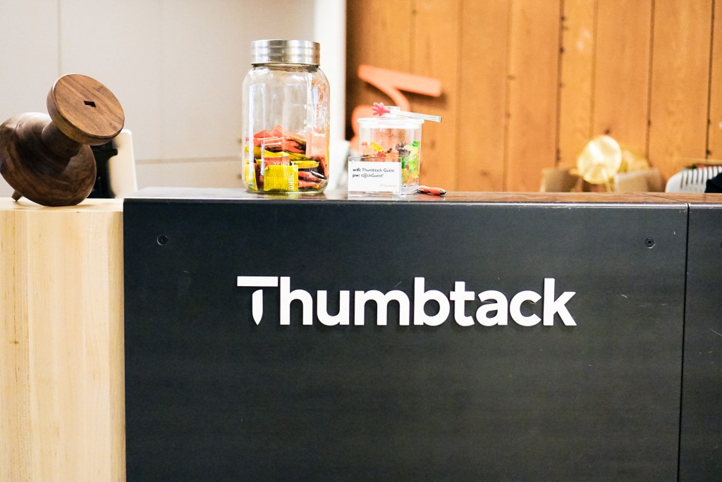 Thumbtack front desk sign