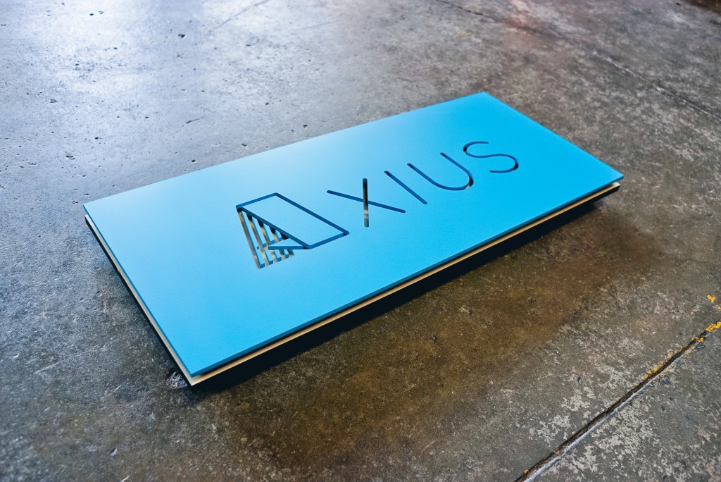 axius blue illuminated sign