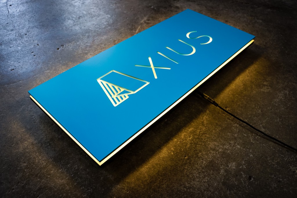 axius blue illuminated sign