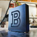 b black tabletop sign