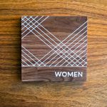 CNP walnut bathroom signs