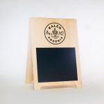 modern a-frame in natural light wood with chalkboard