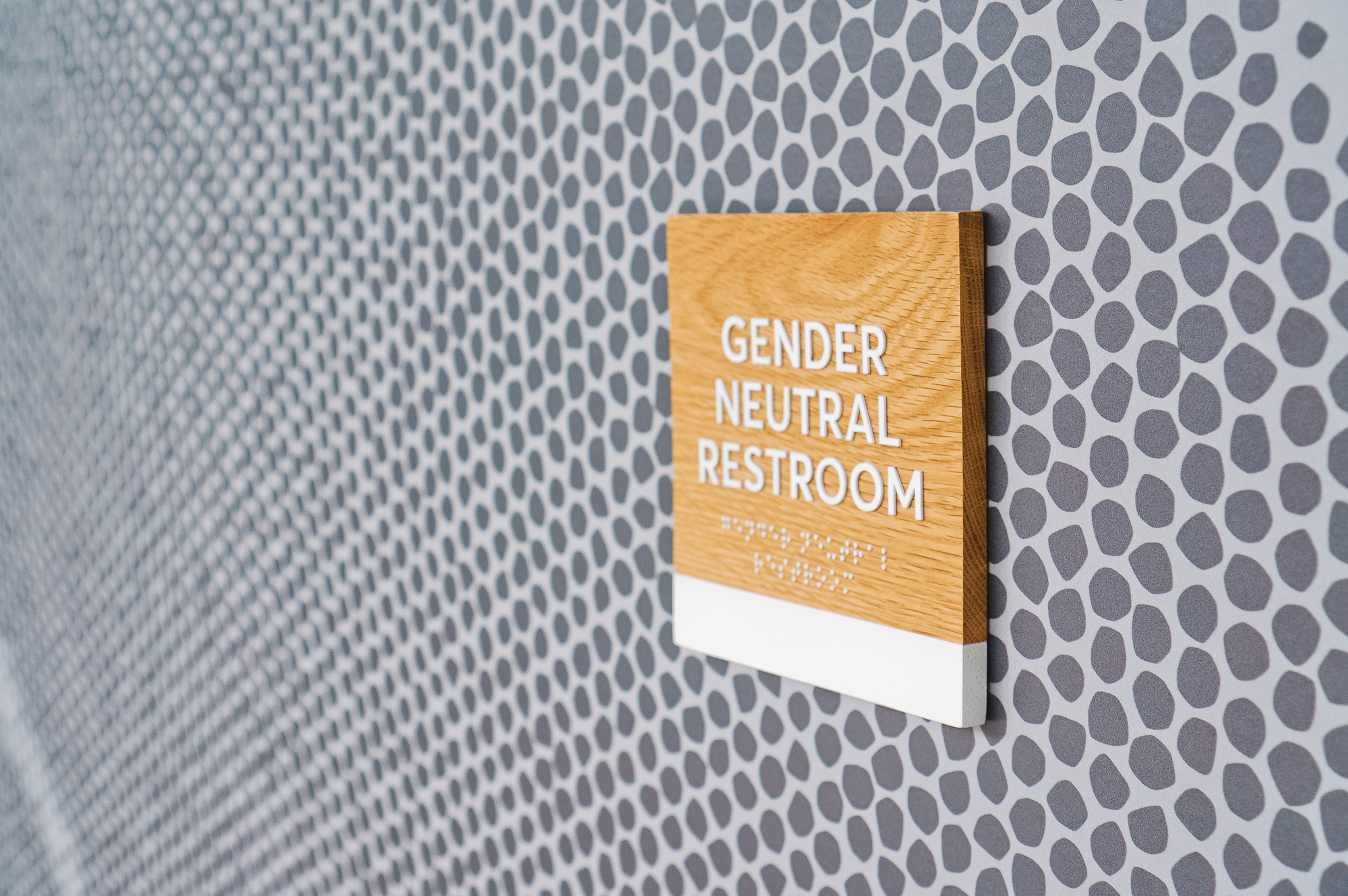 White-painted wood, California ADA signs for the office of Slack, a cloud-based set of proprietary team collaboration tools and services.