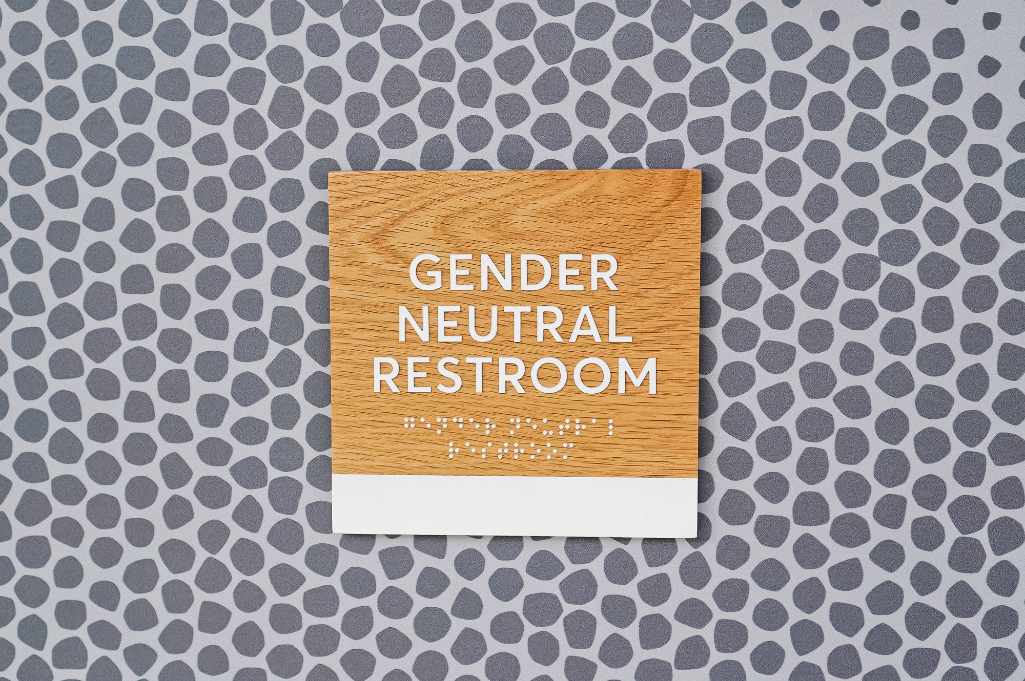 White-painted wood, California ADA signs for the office of Slack, a cloud-based set of proprietary team collaboration tools and services.