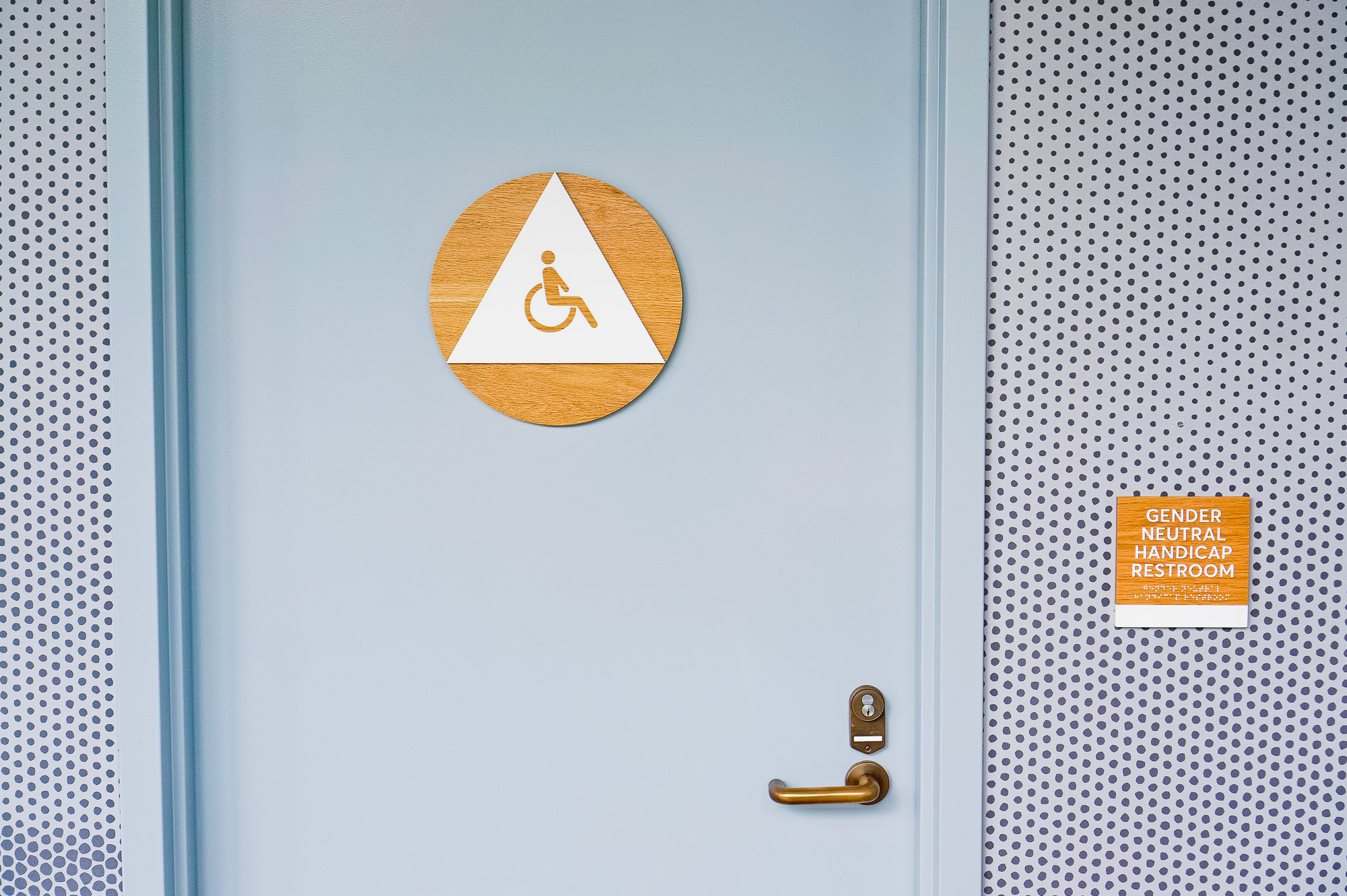 White-painted wood, California ADA signs for the office of Slack, a cloud-based set of proprietary team collaboration tools and services. White-painted wood, California ADA signs for the office of Slack, a cloud-based set of proprietary team collaboration tools and services.