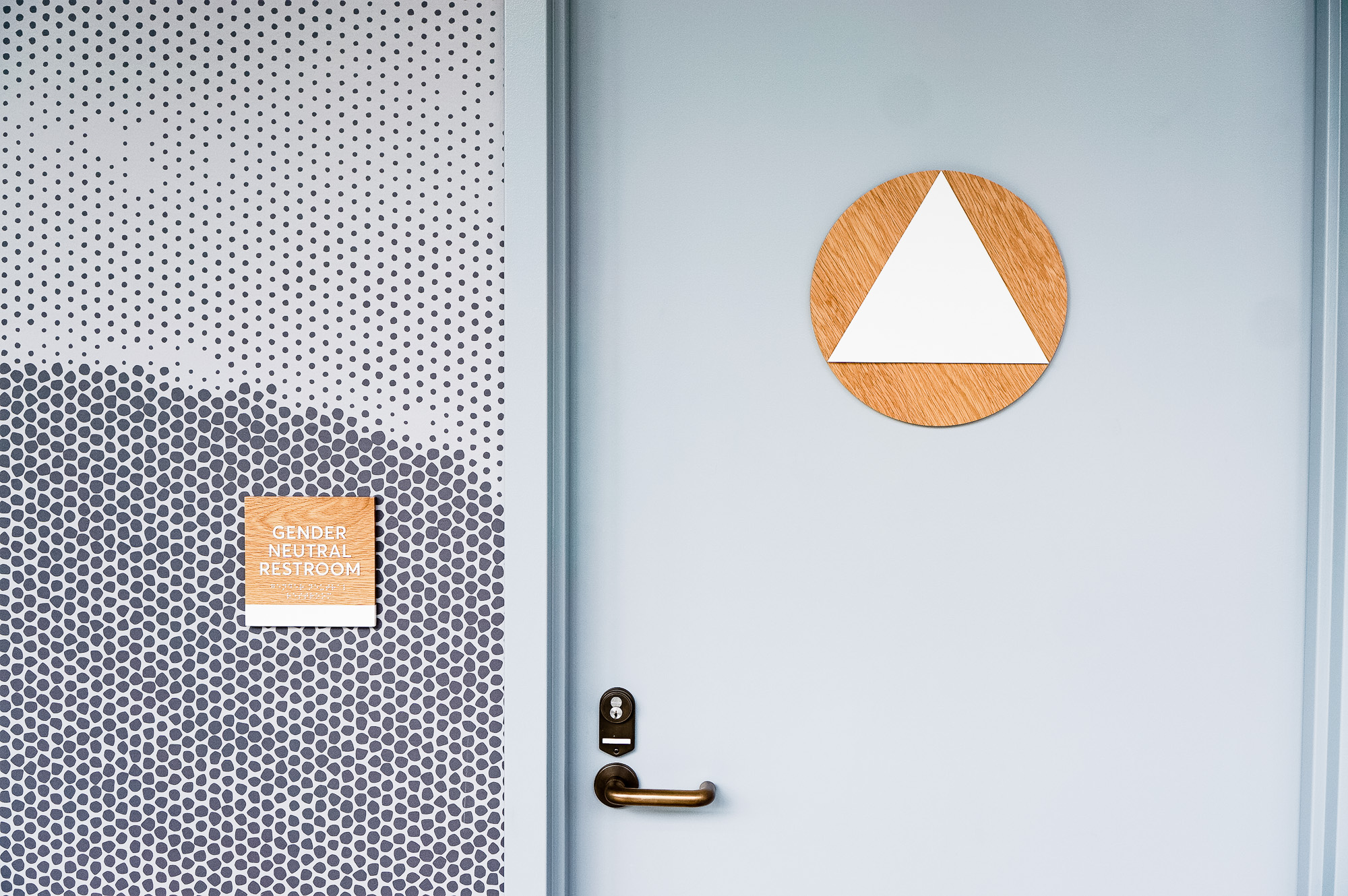 White-painted wood, California ADA signs for the office of Slack, a cloud-based set of proprietary team collaboration tools and services.