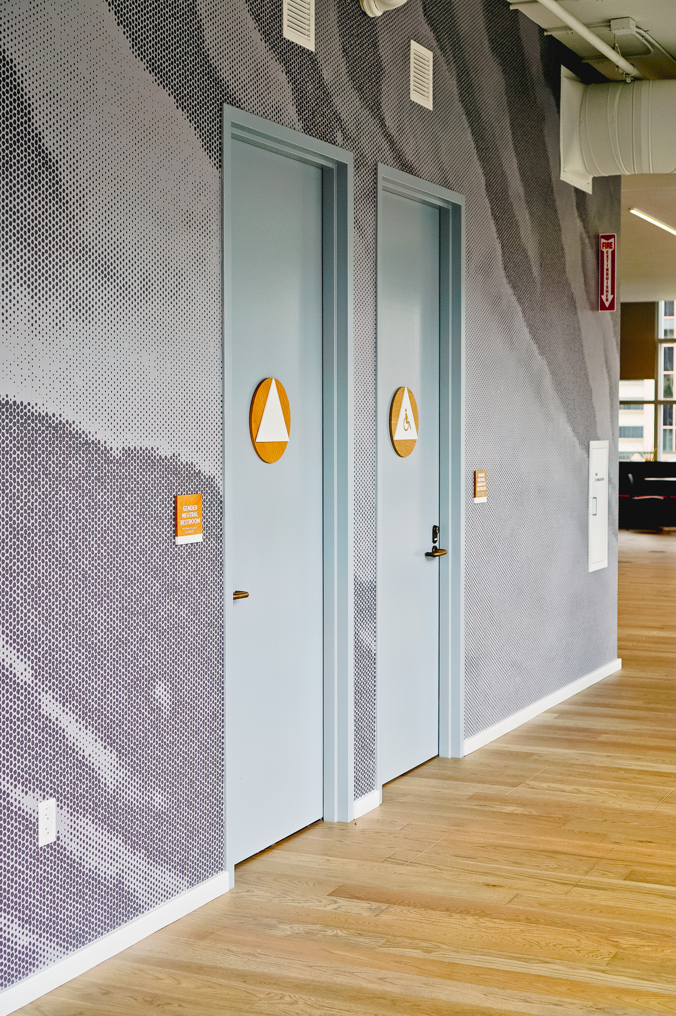 White-painted wood, California ADA signs for the office of Slack, a cloud-based set of proprietary team collaboration tools and services. White-painted wood, California ADA signs for the office of Slack, a cloud-based set of proprietary team collaboration tools and services.