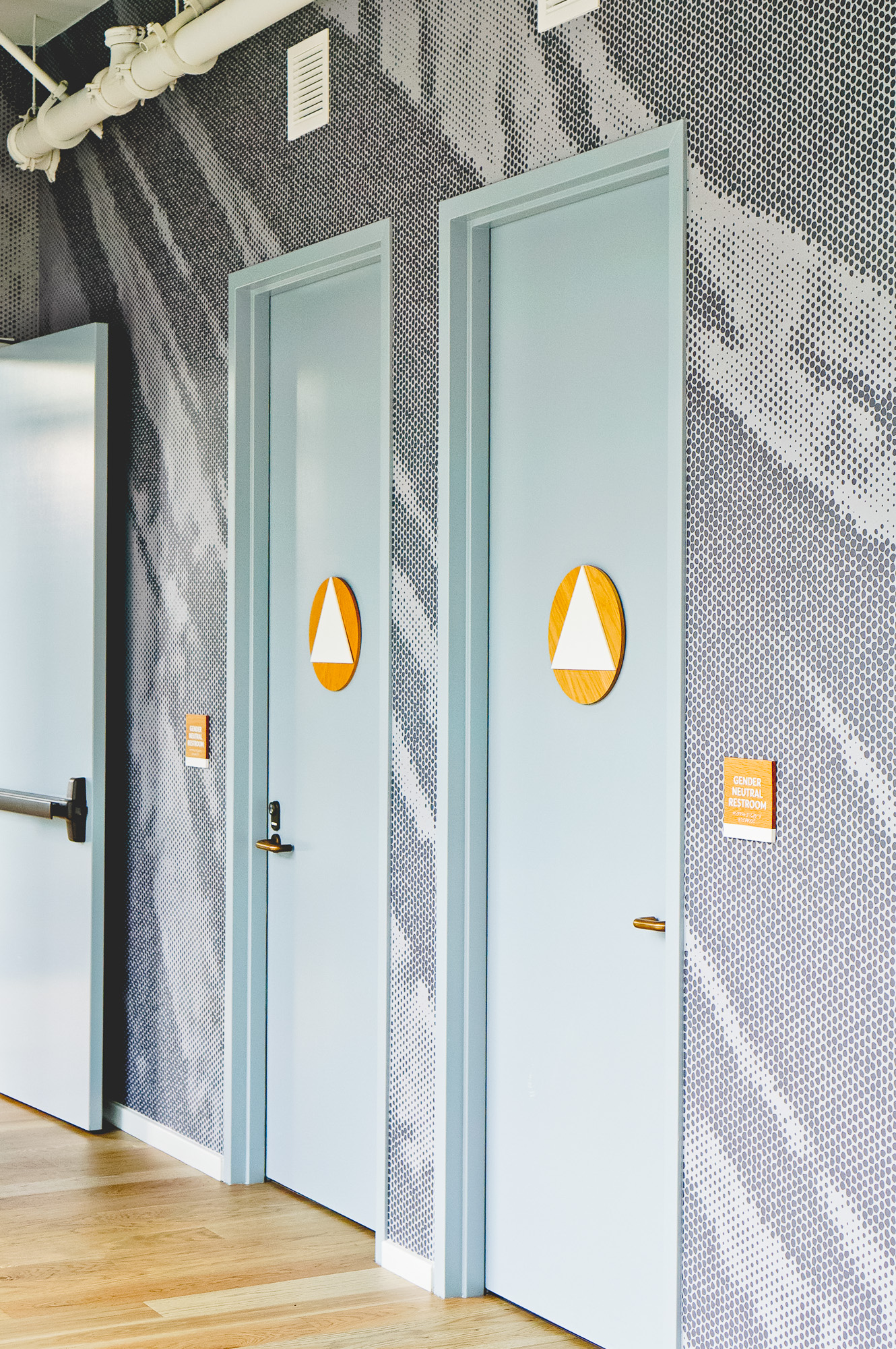 White-painted wood, California ADA signs for the office of Slack, a cloud-based set of proprietary team collaboration tools and services. White-painted wood, California ADA signs for the office of Slack, a cloud-based set of proprietary team collaboration tools and services.