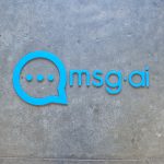 msg.ai light blue tech/startup lobby logo sign