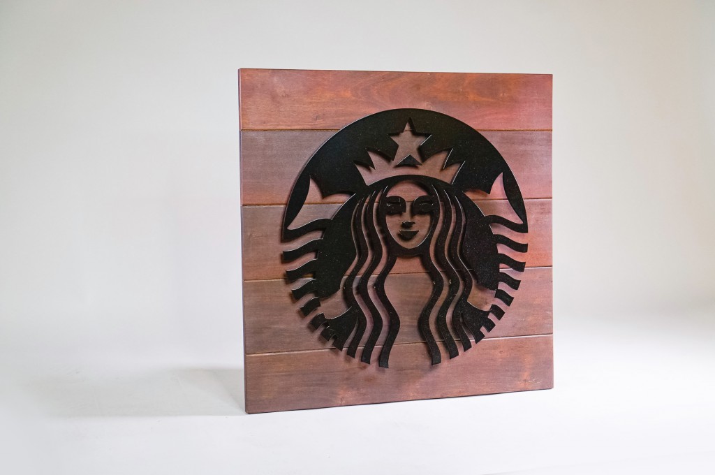 Starbucks outdoor cafe blade sign at Zephyr Walk - Wood Slat Epay with black metal artwork