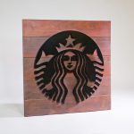 Starbucks outdoor cafe blade sign at Zephyr Walk - Wood Slat Epay with black metal artwork