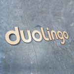 duolingo large light wood logo floating wall sign