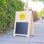 Simple Things modern light wood A-frame with color logo and chalkboard