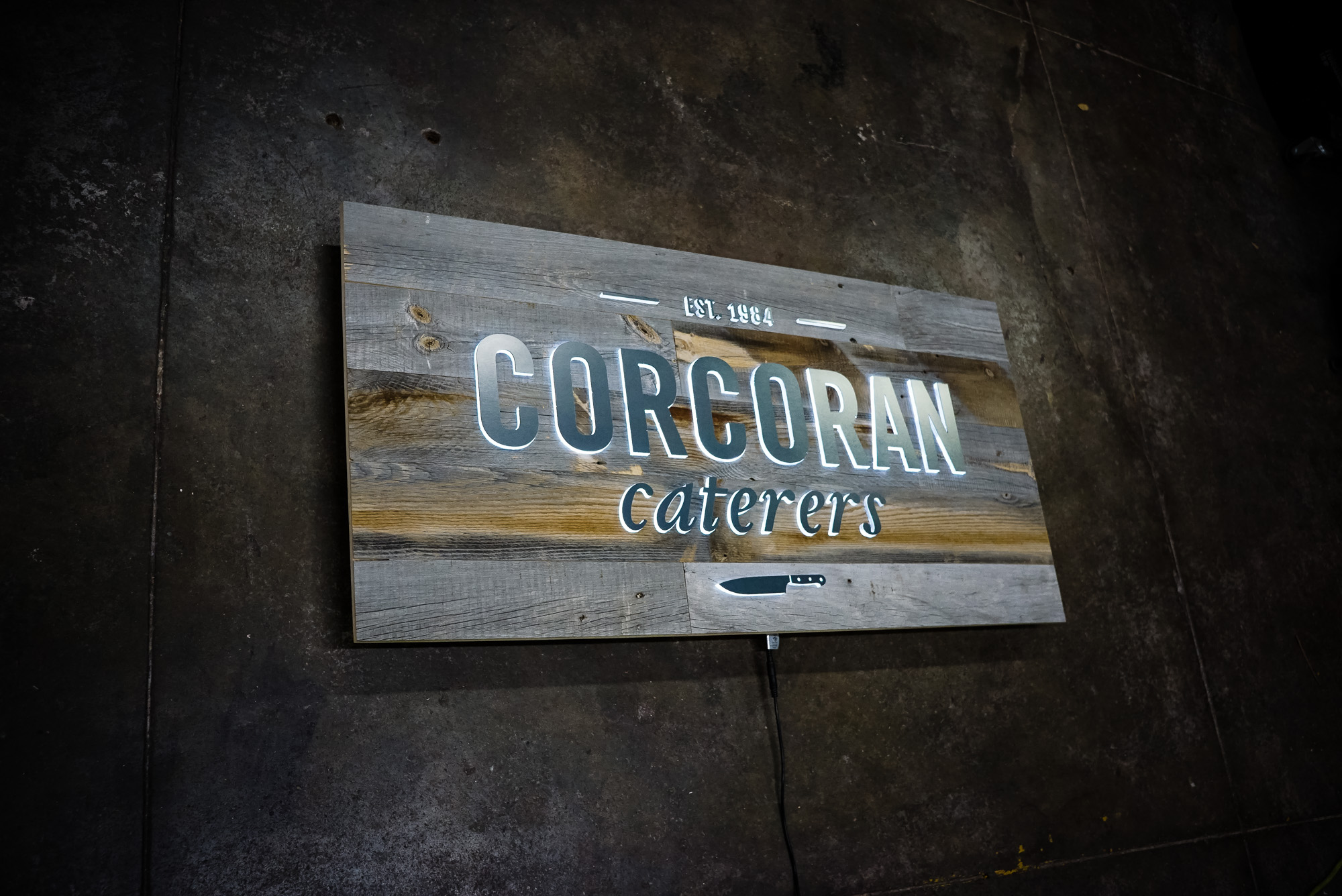 Corcoran Caterers Illuminated Sign