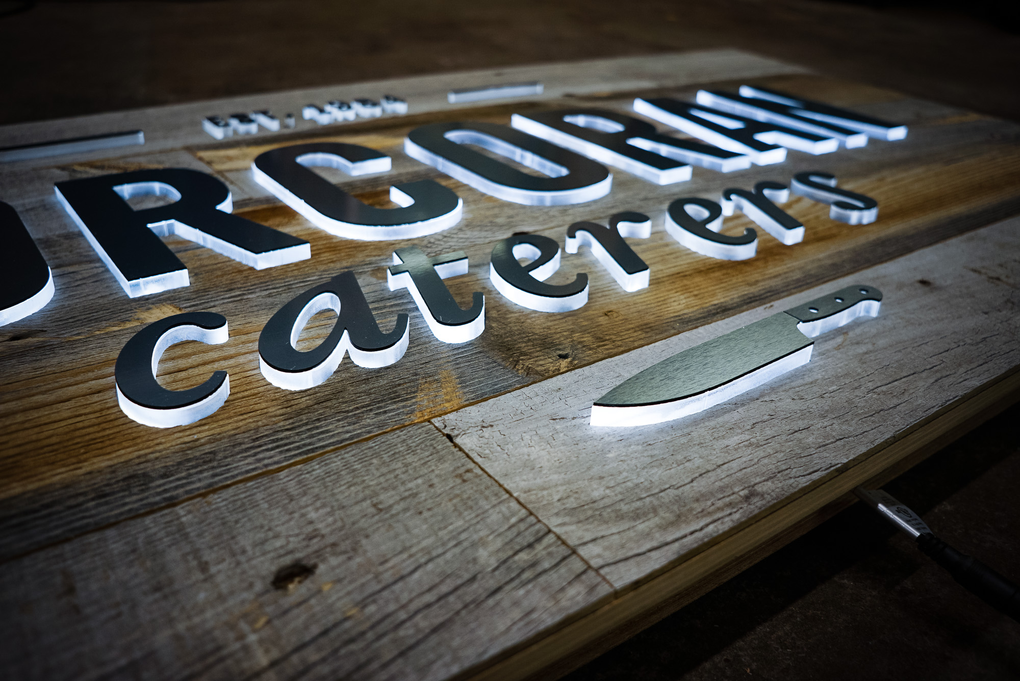 Corcoran Caterers Illuminated Sign