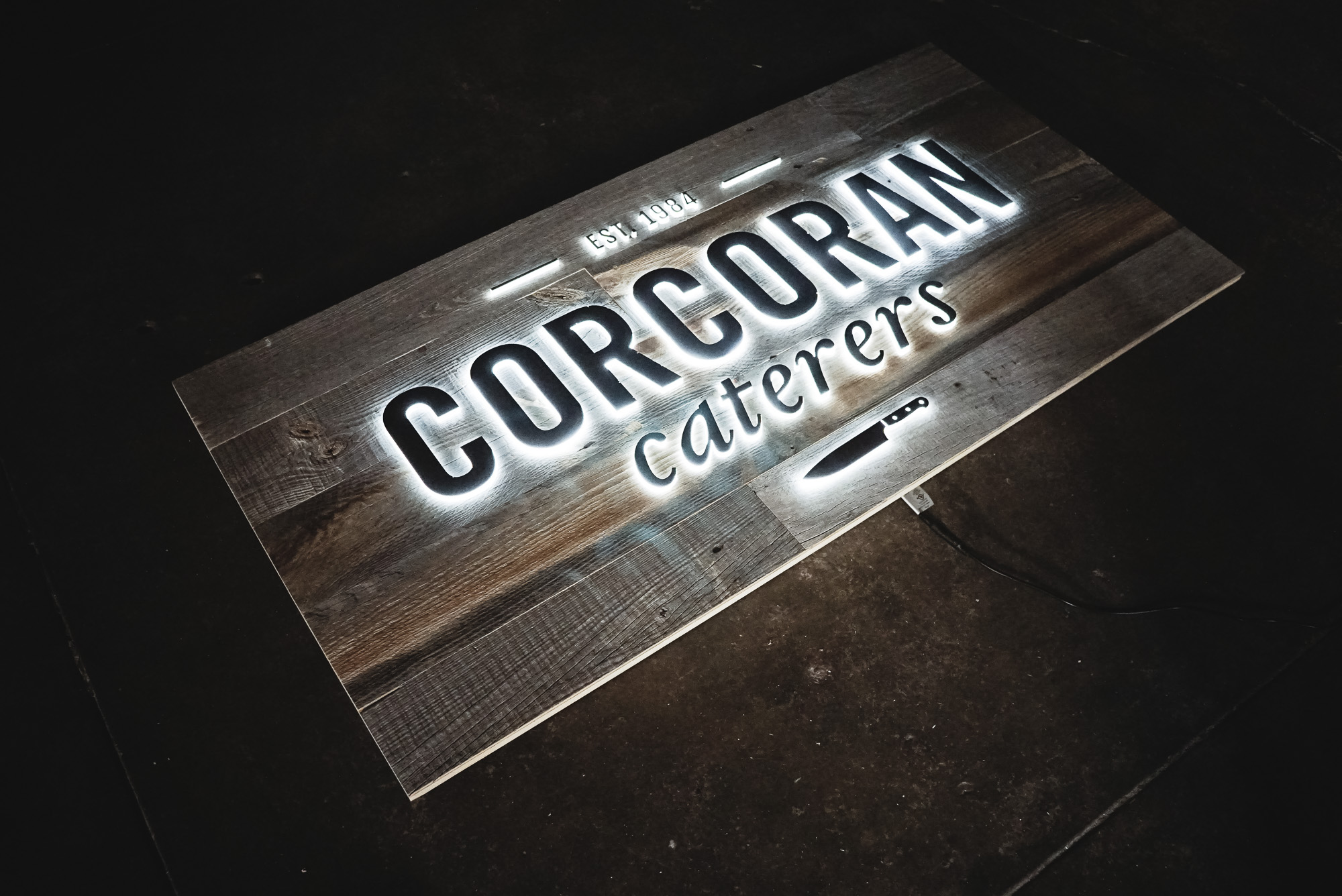Corcoran Caterers Illuminated Sign