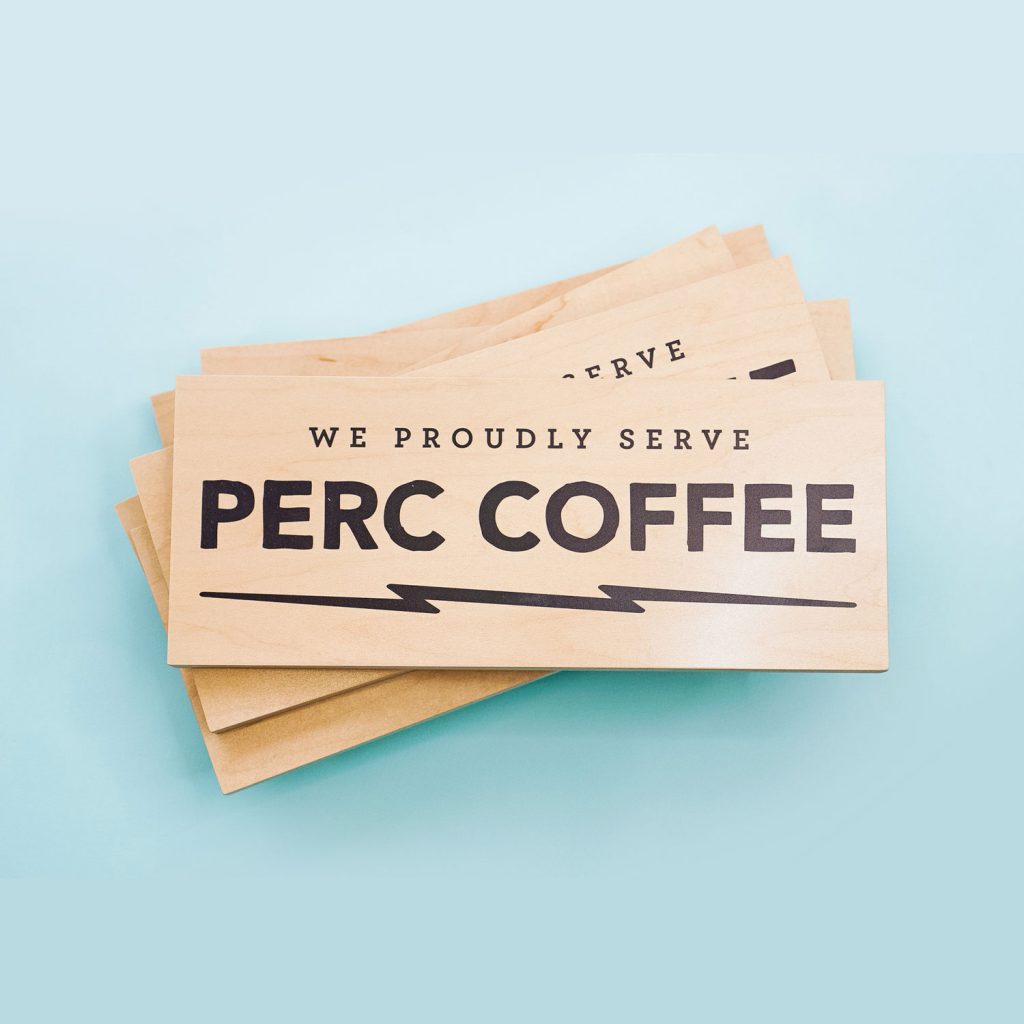 One of several wood retail signs for Perc Coffee, a coffee roaster based in Savannah, GA.