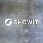 White floating wall sign for Showit, a company that creates a website builder for photographers.