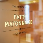 23k gold leaf signage honoring the names of iconic women, on glass doors at The Wing San Francisco, a co-working space for women.