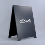 Minimalist black and white A-frame for Allbirds, a San Francisco-based direct-to-consumer startup aimed at designing environmentally friendly footwear.