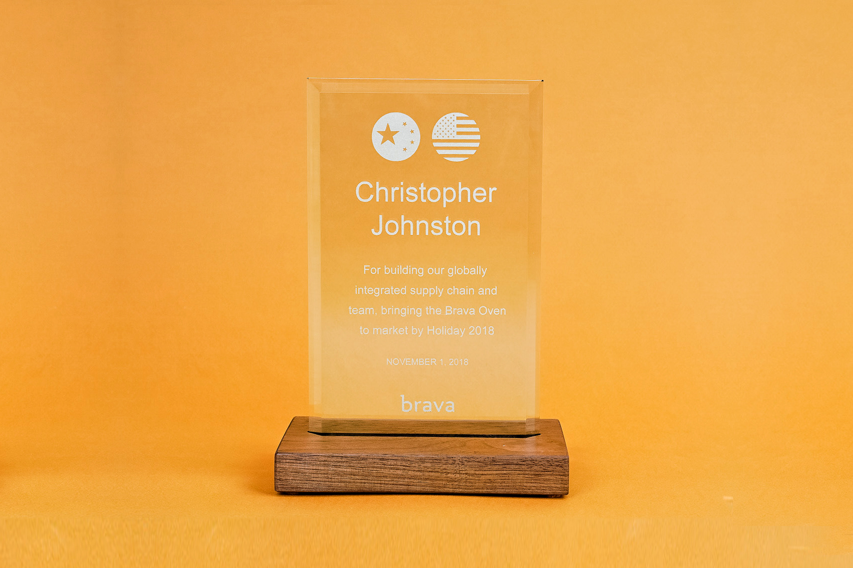 Simple walnut and engraved glass award for Brava, a company that creates a smart countertop oven. Simple walnut and engraved glass award for Brava, a company that creates a smart countertop oven.