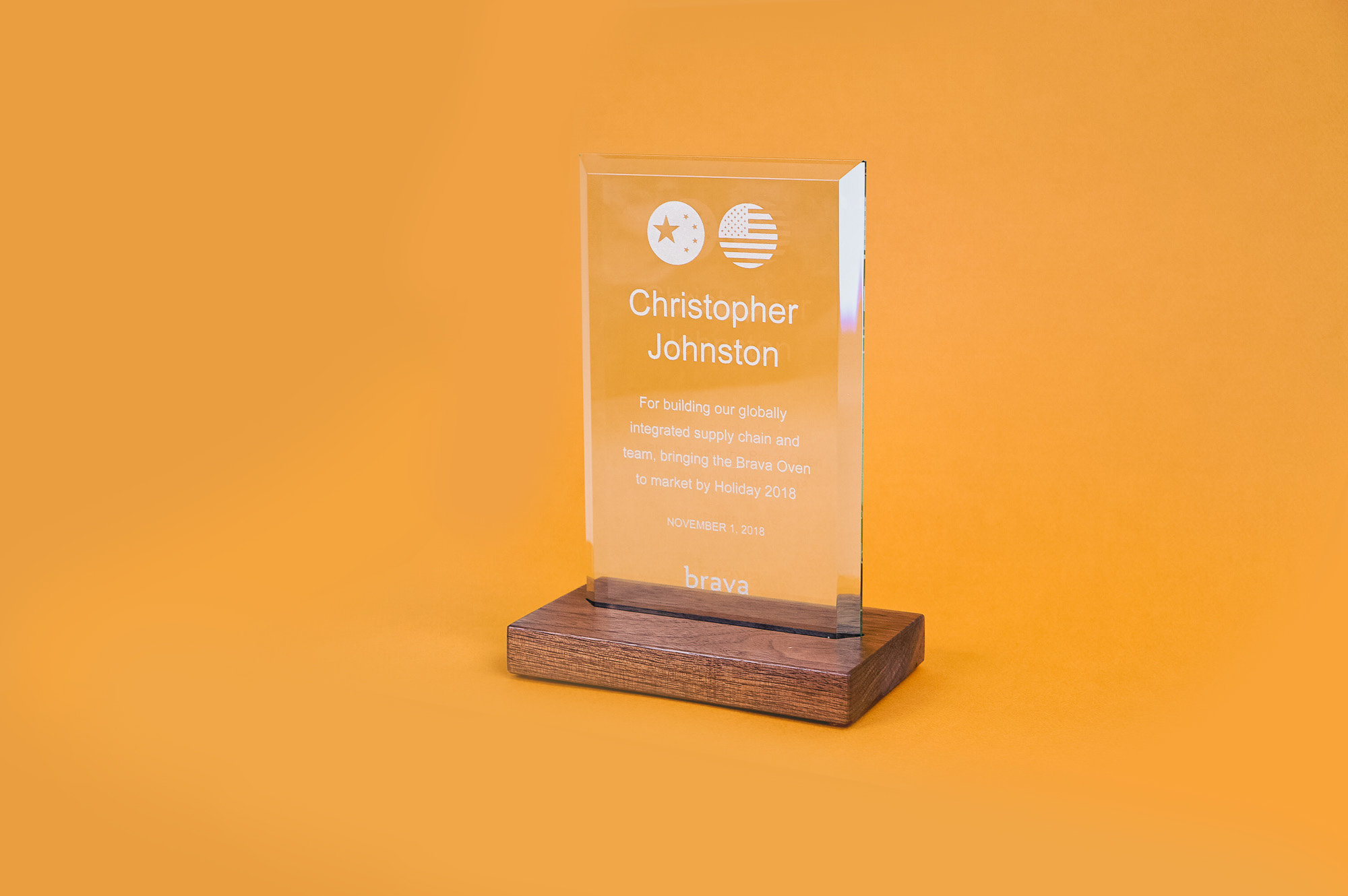 Simple walnut and engraved glass award for Brava, a company that creates a smart countertop oven. Simple walnut and engraved glass award for Brava, a company that creates a smart countertop oven.