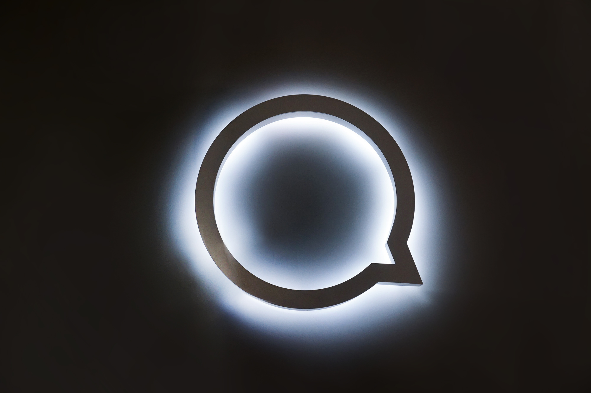 White halo lit illuminated sign for Button, a company that powers mobile partnerships.White halo lit illuminated sign for Button, a company that powers mobile partnerships. White halo lit illuminated sign for Button, a company that powers mobile partnerships.