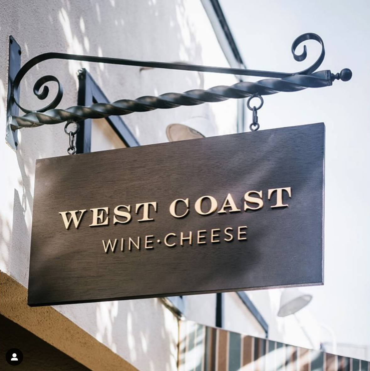 Outdoor hanging sign for West Coast Wine and Cheese, a San Francisco based bar and gastropub. Outdoor hanging sign for West Coast Wine and Cheese, a San Francisco based bar and gastropub.