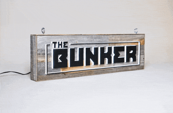 Illuminated, reclaimed wood sign for The Bunker, a comedy club in Burbank, CA. Illuminated, reclaimed wood sign for The Bunker, a comedy club in Burbank, CA.