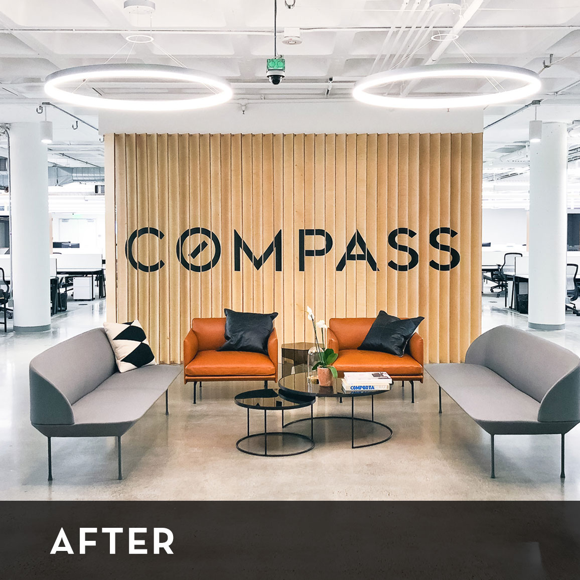 Optical-illusion, multi panel wood sign / privacy screen at the San Francisco office of Compass, a modern real estate platform.