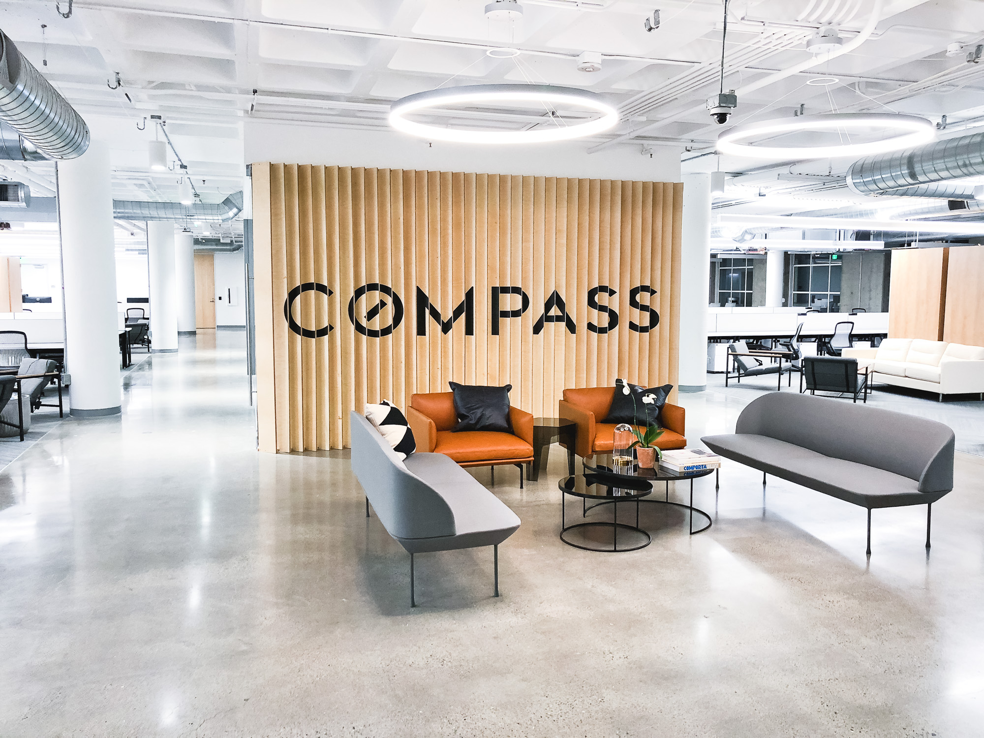 Optical-illusion, multi panel wood sign / privacy screen at the San Francisco office of Compass, a modern real estate platform. Optical-illusion, multi panel wood sign / privacy screen at the San Francisco office of Compass, a modern real estate platform.