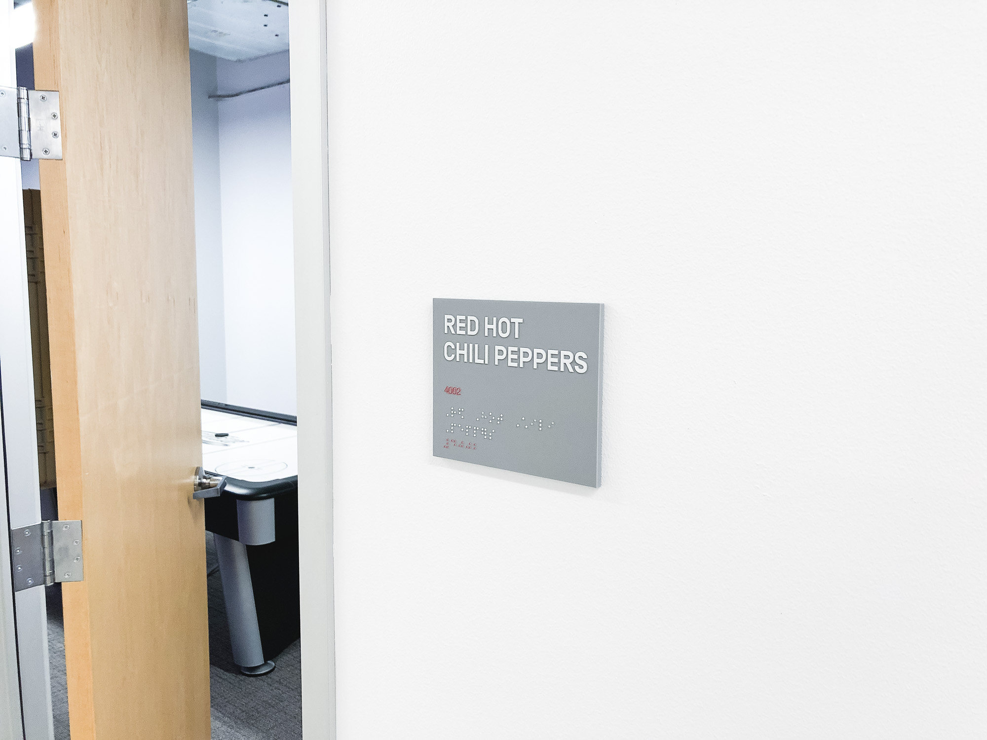 Grey and white meeting room ADA signs with Braille for the San Francisco office of Gong, a conversation intelligence platform for sales. Grey and white meeting room ADA signs with Braille for the San Francisco office of Gong, a conversation intelligence platform for sales.
