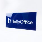 Glossy navy blue sign with white artwork for HelloOffice, a San Francisco based commercial brokerage built by startup founders, for startup founders.