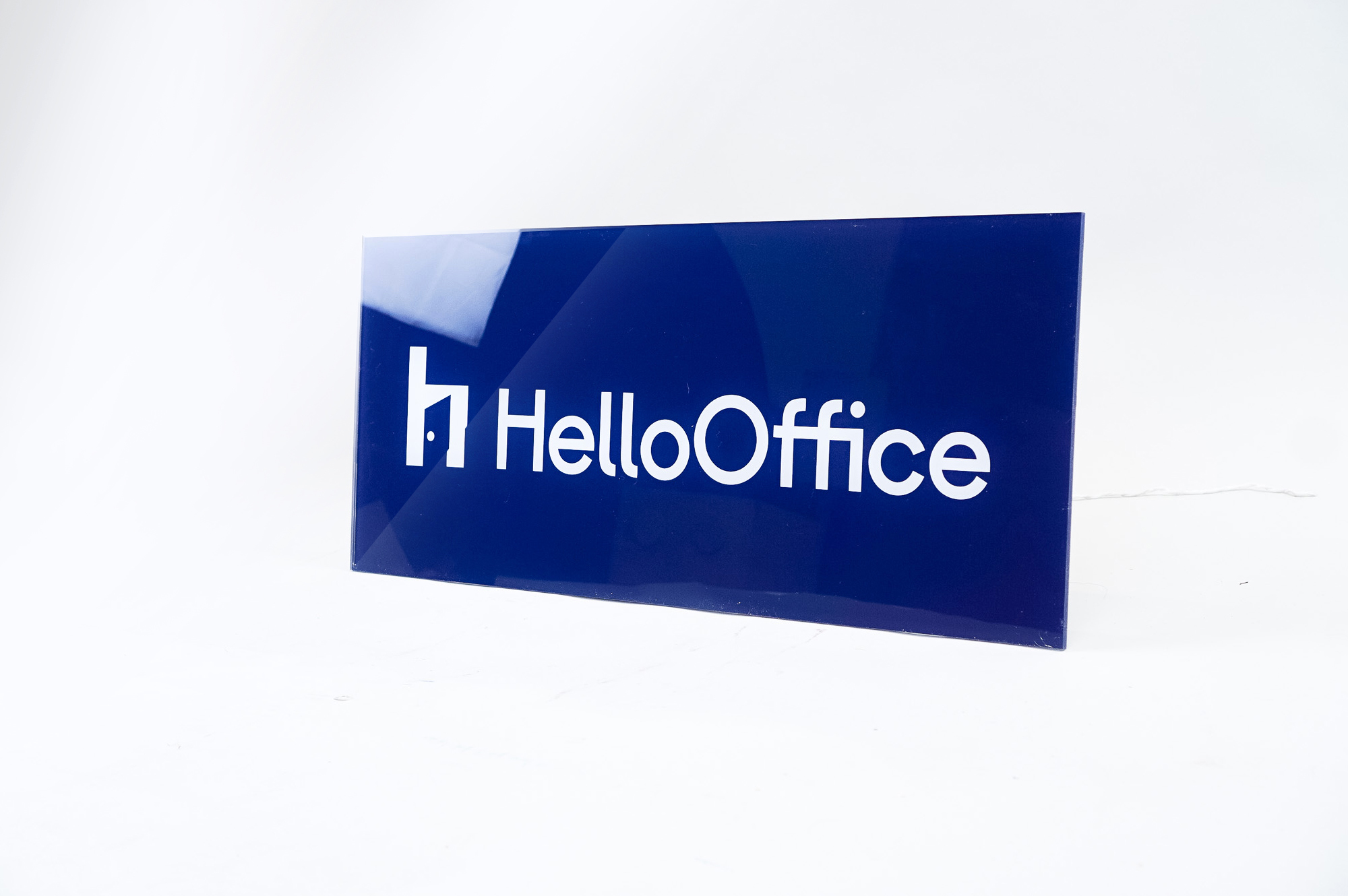 Glossy navy blue sign with white artwork for HelloOffice, a San Francisco based commercial brokerage built by startup founders, for startup founders. Glossy navy blue sign with white artwork for HelloOffice, a San Francisco based commercial brokerage built by startup founders, for startup founders.