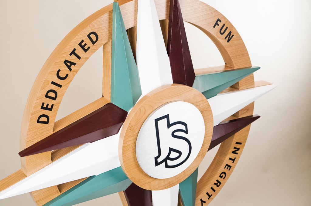 Painted wood sign for Jansport, an American brand of backpacks and collegiate apparel, at VFC headquarters in Alameda, CA