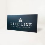 Raised dark navy blue raised sign with white lettering for Life Line Financial Group, a multi-family office with a dedicated team of Certified Financial Planners