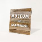 Reclaimed wood blade sign with white artwork for Museum of 3D Illusions in San Francisco.