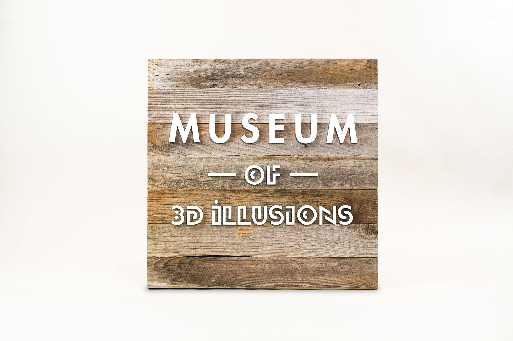 Reclaimed wood blade sign with white artwork for Museum of 3D Illusions in San Francisco. Reclaimed wood blade sign with white artwork for Museum of 3D Illusions in San Francisco.