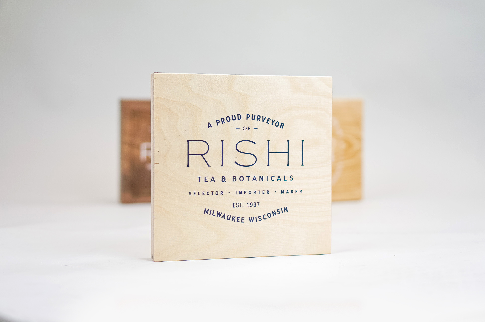 Plywood retail/cafe sign with white artwork for RIshi, a Direct Trade importer of organic teas and botanicals from the very best sources. Plywood retail/cafe sign with white artwork for RIshi, a Direct Trade importer of organic teas and botanicals from the very best sources.